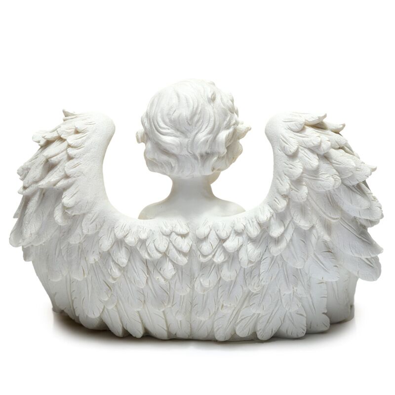 White sculpture of a cherub with wings on a white background