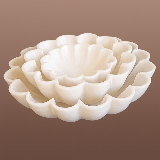 Hand-carved marble vases with sculptural design and natural stone elegance. The Sculptural Marble Vase Trio includes three artisan-crafted pieces, each numbered and authenticated with SKU and barcode. Perfect for modern or classic interiors, these hand-carved marble vases blend craftsmanship and timeless beauty