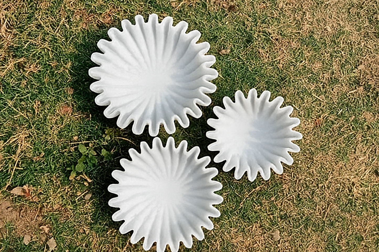 Hand-carved marble vases with sculptural design and natural stone elegance. The Sculptural Marble Vase Trio includes three artisan-crafted pieces, each numbered and authenticated with SKU and barcode. Perfect for modern or classic interiors, these hand-carved marble vases blend craftsmanship and timeless beauty