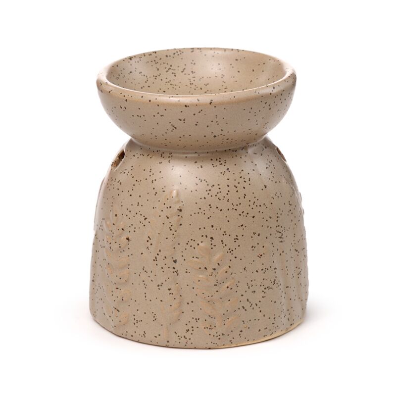 Speckled beige ceramic oil burner on a white background
